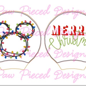 May include: Two round ornaments with a white background. One ornament features a black outline of Mickey Mouse ears with colorful lights strung around them. The other ornament has the text "Merry Christmas" in red and green.
