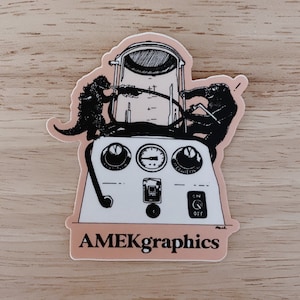 Zilla vs. Kong Porti-boy embalming machine sticker