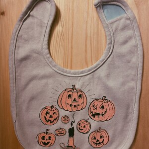 A Pumpkin-y Halloween infant bib