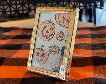Jack O’Lantern mini golden framed screenprint