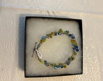 Crocheted Wire bracelet with glass cube multi color, blue and lime green beads, Adjustable