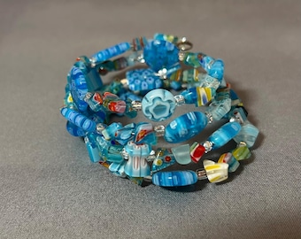 Light blue millefiori multi glass bead Memory Wire bracelet