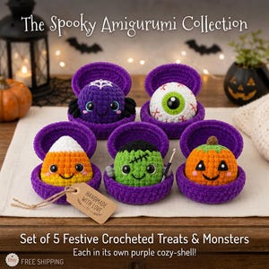 May include: A set of five crocheted amigurumi figures in purple shells, including a spider, an eyeball, candy corn, a green monster, and a pumpkin. A brown tag labeled Handmade with Love is attached to the candy corn. Text reads The Spooky Amigurumi Collection.