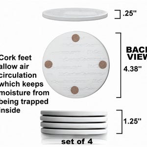 May include: Set of four white ceramic coasters with cork feet. Each coaster measures 4.38 inches in diameter and 0.25 inches thick. The coasters are stacked on top of each other, with the top coaster showing the cork feet.