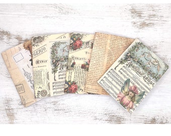 May include: A set of six vintage-style paper sheets with floral and musical designs. The sheets feature a variety of patterns, including roses, birds, and musical notes. The text on the sheets includes the words "Meridias Song" and "Merletti".