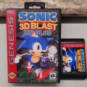 May include: A black plastic video game case and a matching game cartridge for Sonic 3D Blast DX Plus for the Sega Genesis. The cover art features the blue Sonic character running against a dark forest background with the game title in bold yellow text.