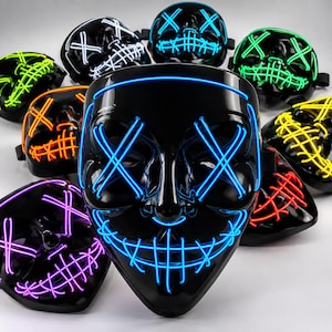May include: A collection of black plastic masks featuring glowing EL wire designs in various colors including blue, green, orange, yellow, red, purple, and white. Each mask displays an X-shaped pattern over the eyes and stitched mouth details.