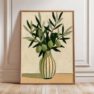 May include: A framed oil painting on canvas depicting a striped vase in shades of cream and green, holding a cluster of olive branches with dark green leaves and light green olives, set against a textured, neutral-toned background.