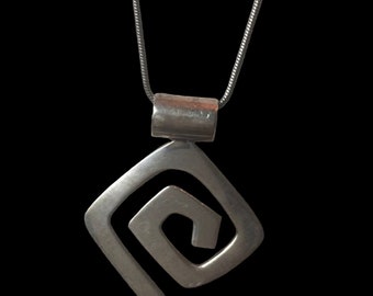 Mid Century Modern Minimalist Sterling Silver Spiral 925 Pendant on a silver toned chain.