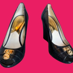 Michael Kors Black Leather Wedges With Gold MK Lock Size 7 ladies