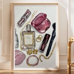 May include: An oil painting on canvas featuring a collection of beauty items including a perfume bottle with a gold label, a dark red lipstick, a compact mirror, a makeup brush, two gold rings, a gold chain necklace, and a pink stone.