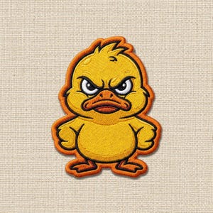 May include: An embroidered patch featuring a yellow duckling with a grumpy facial expression, furrowed eyebrows, and a dark orange beak. The design is outlined in a thick orange border, showcasing detailed stitching throughout the character's body.