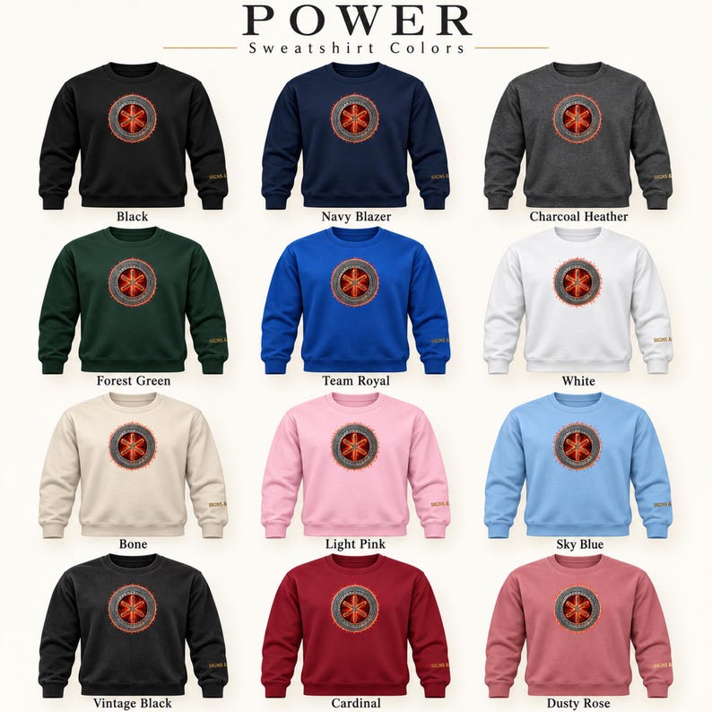 May include: A collection of twelve crewneck sweatshirts in various colours including black, navy, charcoal, forest green, royal blue, white, bone, light pink, sky blue, vintage black, cardinal, and dusty rose, each featuring a central circular graphic.