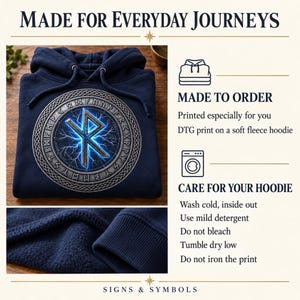 May include: A navy blue fleece hoodie featuring a circular graphic with a central rune symbol surrounded by lightning and a border of runic characters. Text includes MADE FOR EVERYDAY JOURNEYS, MADE TO ORDER, and CARE FOR YOUR HOODIE with laundry instructions.