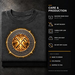 May include: A charcoal gray t-shirt featuring a circular graphic with a glowing orange runic symbol surrounded by a braided border. To the right, text lists CARE & PRODUCTION instructions including machine wash cold at 30&deg;C/90&deg;F, do not bleach, tumble dry low, iron low heat, and do not dry clean.