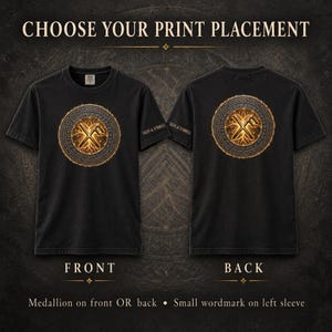 May include: A black t-shirt shown from the front and back, featuring a circular medallion with a glowing golden rune design and a braided border. The text "SIGNS & SYMBOLS" is printed on the left sleeve. The image includes the text "CHOOSE YOUR PRINT PLACEMENT".