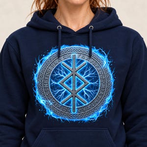 May include: A navy blue hooded sweatshirt featuring a central graphic of a metallic runic symbol enclosed within a circular border of Norse runes, surrounded by a vibrant blue electric lightning effect on the front chest area.