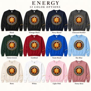 May include: A collection of twelve crewneck sweatshirts in various colors, each featuring a central circular graphic with a glowing orange rune design. The text ENERGY 12 COLOR OPTIONS appears at the top, with color names below each shirt.