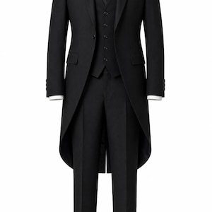 May include: A black morning suit comprising a tailcoat, a matching five-button waistcoat, and trousers. The outfit is completed with a crisp white dress shirt, a solid black necktie, and a white pocket square placed in the left chest pocket.