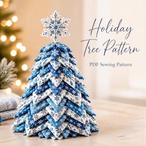 Sömnadsmönster för julgran i quiltat tyg i PDF-format med snöflingetopping