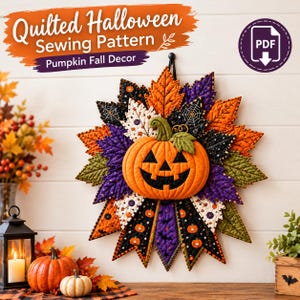 May include: A quilted wall hanging featuring a central orange jack-o'-lantern surrounded by a starburst of fabric leaves in orange, purple, black, and white patterns. The text reads Quilted Halloween Sewing Pattern Pumpkin Fall Decor.