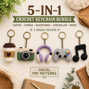May include: A 5-in-1 crochet keychain bundle featuring digital PDF patterns for five designs: a coffee cup, a camera, headphones, a game controller, and a music note. Each keychain is crafted with yarn and attached to a bronze-colored metal ring.