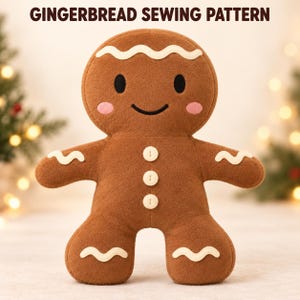 May include: A brown gingerbread person plush toy with white wavy icing details on the head, arms, and legs. The face features black eyes, a black smile, and pink cheeks. Three white buttons are centered on the torso. Text reads GINGERBREAD SEWING PATTERN.
