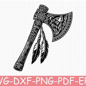 May include: A black and white graphic illustration of a decorative axe featuring a howling wolf head on the blade, intricate geometric patterns on the handle, and two hanging feathers attached by beaded cords. The text SVG-DXF-PNG-PDF-EPS is below.