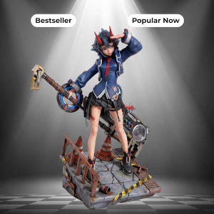 May include: A detailed anime-style figurine of a character with short dark hair and red horns, wearing a blue jacket, red tie, and black skirt. The character holds a large mechanical weapon and stands on a base with traffic cones and a boombox labeled FABULIX.