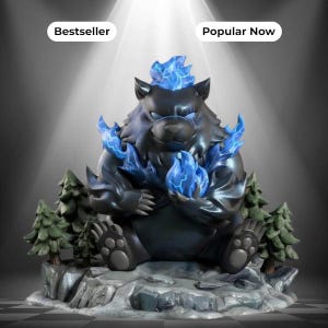 May include: A dark gray bear figurine sitting on a rocky base with small green pine trees. The bear has bright blue flames on its head and paws. Above the bear, two white rectangular labels display the text Bestseller and Popular Now.