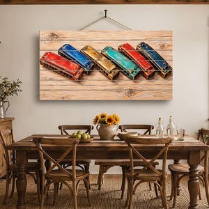May include: A rectangular wall art piece featuring a horizontal arrangement of six vintage harmonicas in red, blue, yellow, teal, and dark blue colors, printed on a light brown wood plank background with visible grain and knots.