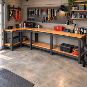 May include: An L-shaped wooden workbench with a dark grey frame, featuring a lower storage shelf, a pegboard wall organiser with various hand tools, a red metal toolbox, a black desk lamp, and multiple storage containers on the surface.