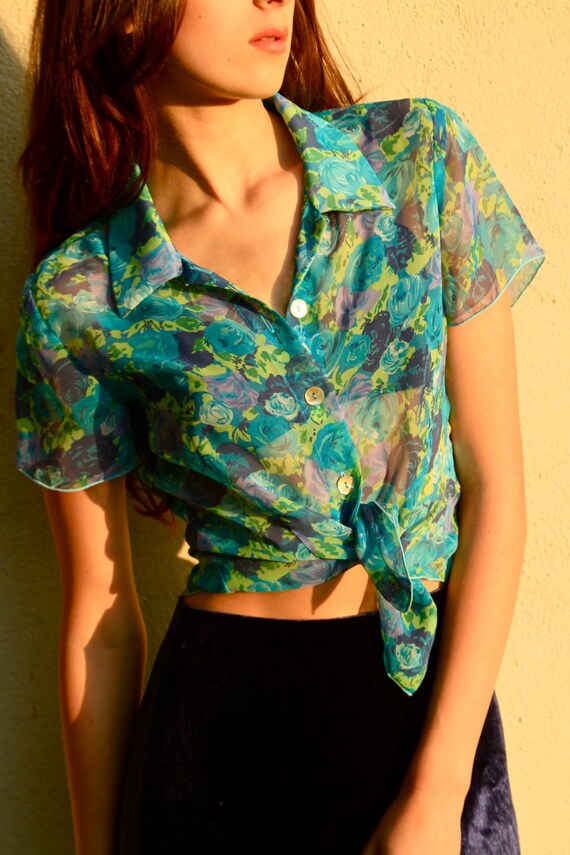 Items similar to Flirty Floral Blouse on Etsy