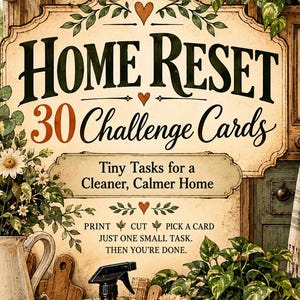 May include: A set of 30 Home Reset Challenge Cards featuring the text 'Tiny Tasks for a Cleaner, Calmer Home' and 'Print, Cut, Pick a Card'. The display includes a wicker basket, a spray bottle, cleaning brushes, a candle, and stacked books.