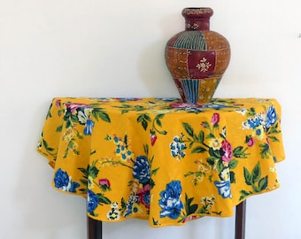 Tablecloth Round Small 110 cm in diameter in yellow cotton with large flower patterns to place on a pedestal table or a round table