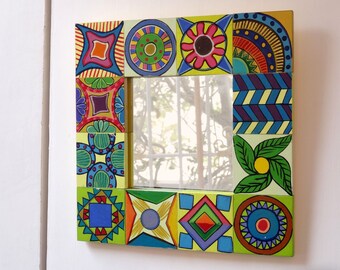 Wooden frame in patchwork of small yellow / green and multicolored hand-painted squares