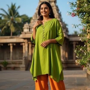 Women's long tunic in plain cotton with a round neck and button at the front, green