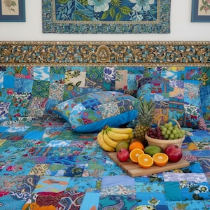 Quilted cotton patchwork bedspread in blue. Lightweight bed cover, elegant quilt, bed throw.