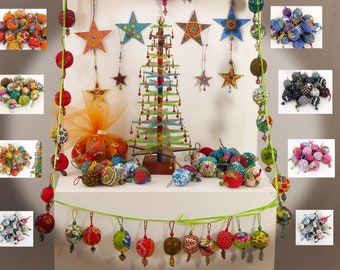 20 Les couronnes de Noël sont de grandes boules de différentes couleurs en tissu fait à la main avec des perles en bois et en verre