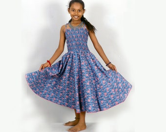 Paneled dress for little girl in blue cotton with pink flower print and high smoked bodice with small straps