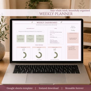 May include: A silver laptop displaying a digital weekly planner template on its screen. The interface features sections for weekly focus, daily tasks, progress charts with percentages, and a calendar view for Friday, September 11, 2026.