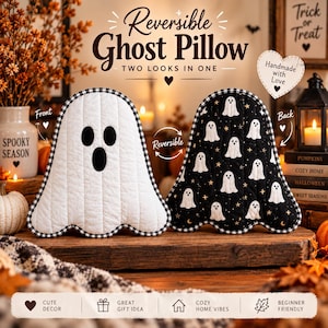 May include: A reversible ghost-shaped pillow featuring a white front with a black ghost face and a black back with a white ghost and star pattern. Both sides are finished with a black and white checkered trim. Text on the image reads Reversible Ghost Pillow.