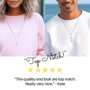 May include: Two people wearing silver necklaces with vertical bar pendants. The pendants have the words "I am Blessed" and "My Angel" engraved on them. The necklaces are on a white background. "Top Notch!" is written in cursive with five stars below. The text "The quality and look are top notch. Really very nice." is attributed to Kate.