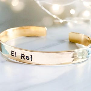 El Roi Hebrew bracelet engraved with the Name of God, 'God Who Sees Me.' This inspirational Christian jewelry piece offers comfort and faith, making it a meaningful Bible verse bracelet. Perfect as a gift for those seeking God's presence.