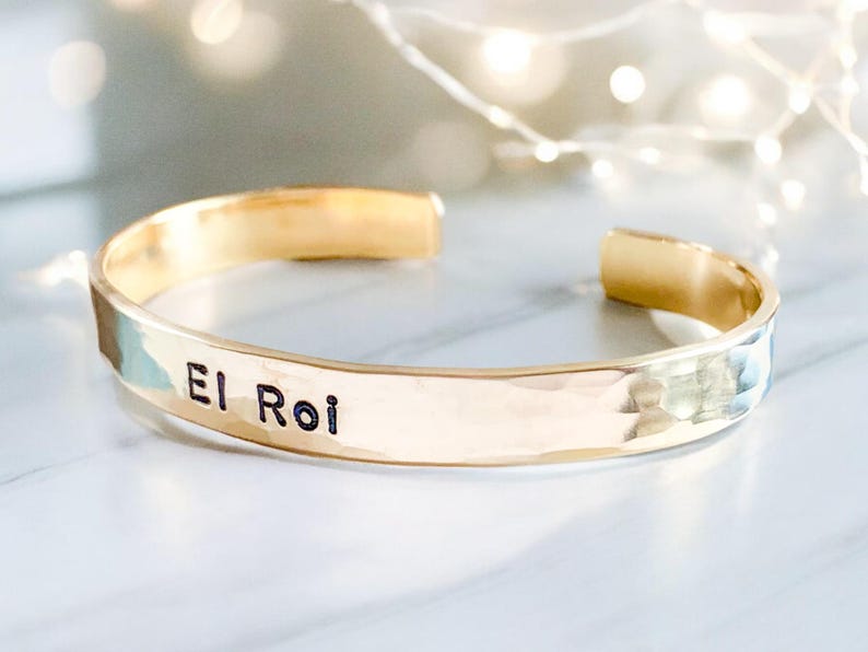 El Roi Hebrew bracelet engraved with the Name of God, 'God Who Sees Me.' This inspirational Christian jewelry piece offers comfort and faith, making it a meaningful Bible verse bracelet. Perfect as a gift for those seeking God's presence.