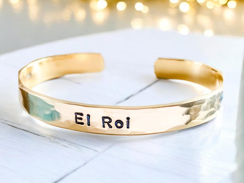 El Roi Hebrew bracelet engraved with the Name of God, 'God Who Sees Me.' This inspirational Christian jewelry piece offers comfort and faith, making it a meaningful Bible verse bracelet. Perfect as a gift for those seeking God's presence.