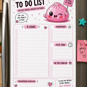 May include: A white to-do list notepad with pink accents, featuring a cartoon pink dumpling character holding a sign that says JE PEUX LE FAIRE. The layout includes sections for tasks, important items, later tasks, reminders, and a reward section.
