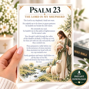 Op de afbeelding: Een rechthoekige print met de tekst Psalm 23 De Heer is mijn herder en het volledige bijbelvers. Het ontwerp bevat een illustratie van een figuur in gewaden die een houten staf en een lam vasthoudt, met twee schapen in een landschap.