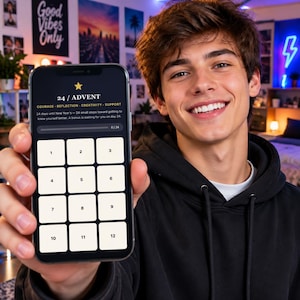 May include: A smartphone displaying a dark-themed app interface titled 24 / ADVENT with a gold star icon. The screen features a grid of twelve numbered white squares, a progress bar, and text reading COURAGE - REFLECTION - CREATIVITY - SUPPORT.