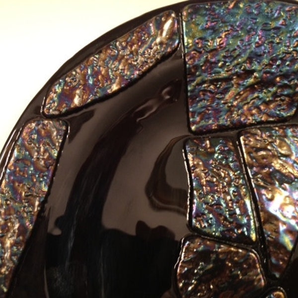 Decorative fused glass plate in gloss black and iridescent texture glass